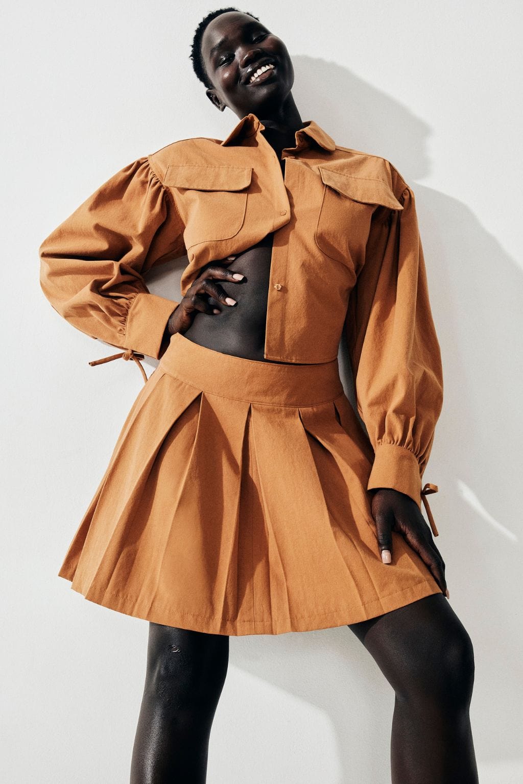 Portia Pleated Mini Skirt Camel | Eliza Faulkner Designs Inc.